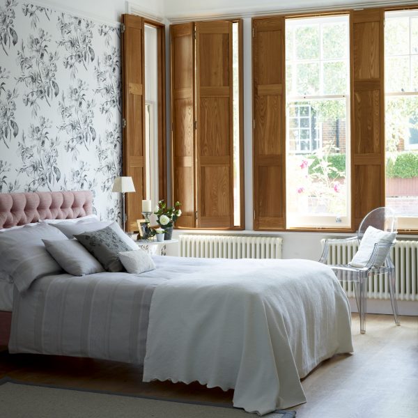 Stained bedroom solid shutters open