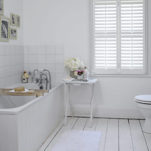 White bathroom hybrawood shutters